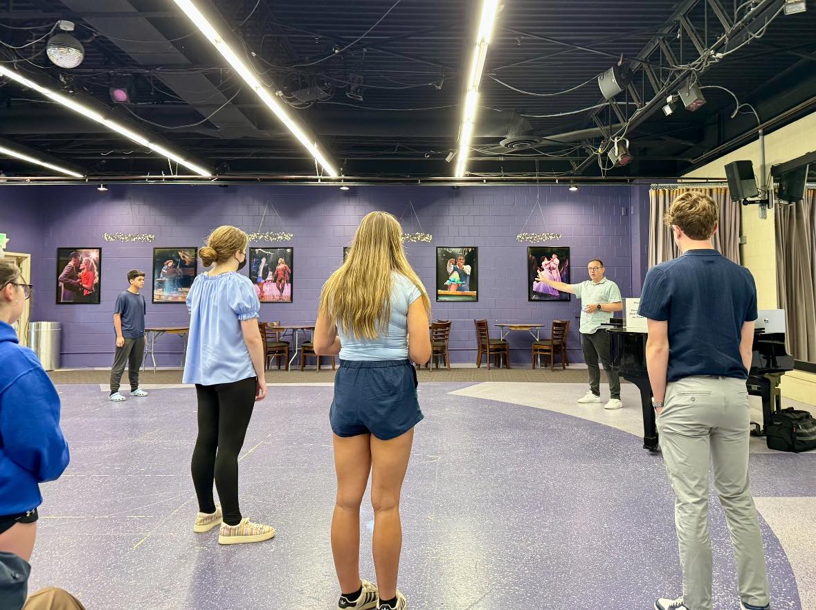 Simon directing students in the NSMT rehearsal studio